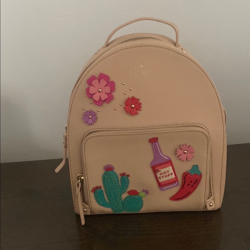 Kate Spade Tan Backpack with Colorful Embellishments